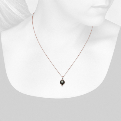 Closeup view of necklace on woman's neck