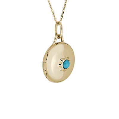 Relicario redondo de oro amarillo de 18k con turquesa redonda en un bisel de estrella de Monica Rich Kosann