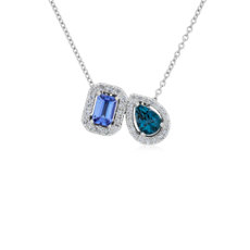 NUEVO. Colgante de dos piedras con tanzanita y topacio azul Londres y halo de diamantes, en oro blanco de 14 k