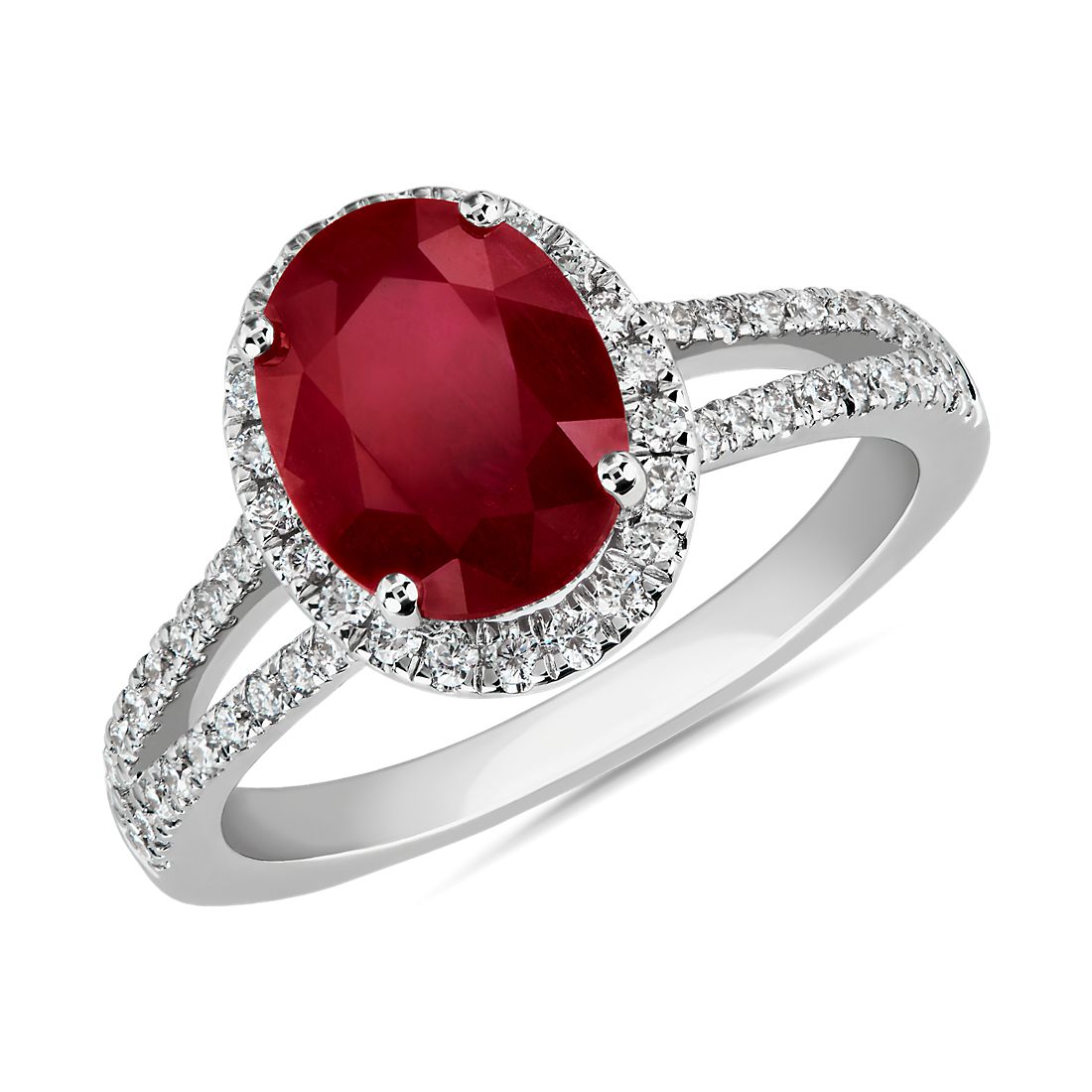 Oval Ruby and Diamond Halo Split Shank Ring in 14k White Gold (9x7mm)