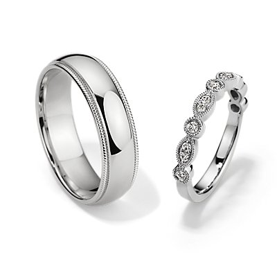 Conjunto de anillo de diseño redondeado y anillo con diamantes de talla marquesa y milgrain en platino