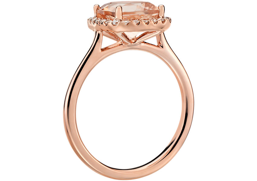 A cushion-cut morganite gemstone engagement ring accented by pavé diamonds in an infinity twist design set in rose gold