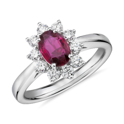 Oval Ruby and Diamond Starburst Halo Ring in 14k White Gold (7x5mm