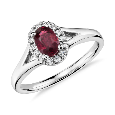 Oval Ruby and Diamond Halo Ring in 18k White Gold (6x4mm