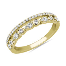 新款 18k 黃金相間排列包邊鑲與爪鑲圓鑽戒指配密釘鑽石。（1/3 克拉總重量）