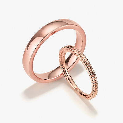 Top view of wedding ring shown with complementary ring