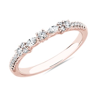 Anillo de diamantes de talla marquesa y redonda con diseño de moño en oro rosado de 14 k (1/5 qt. total)