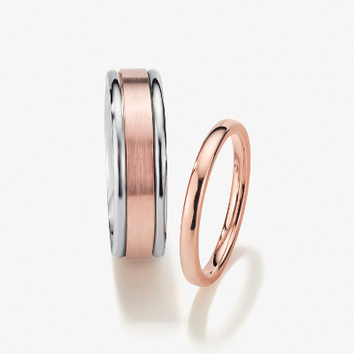 Top view of wedding ring shown with complementary ring