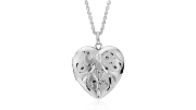 Hand-engraved filigree design heart locket in sterling silver.