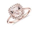 14k rose gold ring featuring a cushion morganite surrounded by a diamond halo.