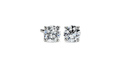 Classic four-claw diamond stud earrings in 14k white gold.