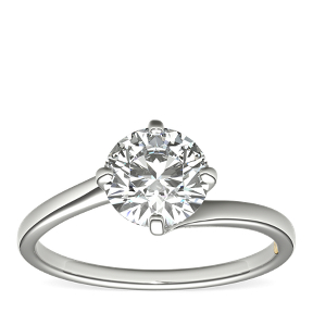 ZAC Zac Posen solitaire east-west engagement ring set with a round centre diamond in platinum.