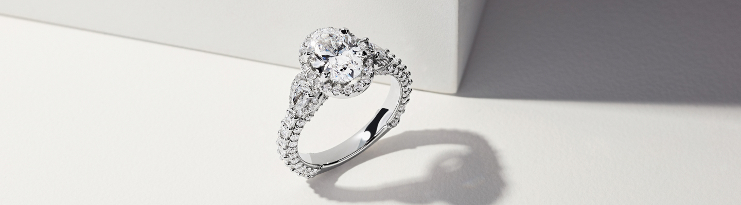 Bella Vaughan oval diamond halo engagement ring.