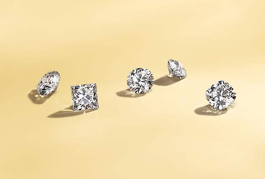 Five loose diamonds in various shapes