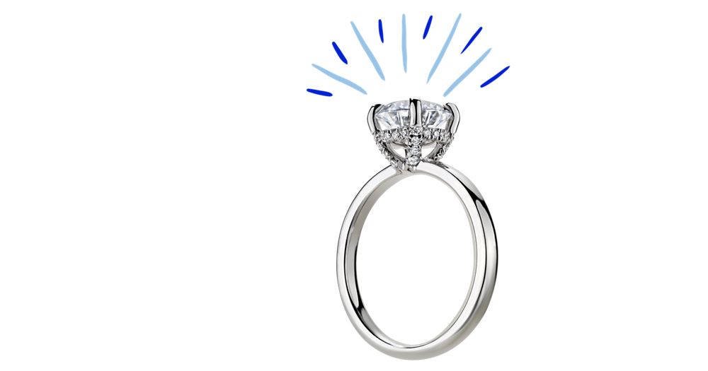 A solitaire diamond engagement ring