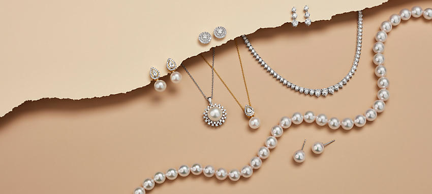 pearl and diamond earrings, diamond studs, pearl pendants, an enternity diamond necklace