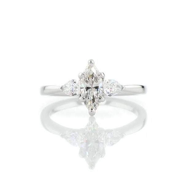 0.55 Carat Pear Sidestone Diamond Engagement Ring
